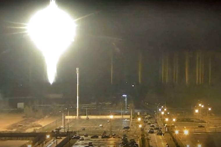 This image made from a video released by Zaporizhzhia nuclear power plant shows bright flaring object landing in grounds of the nuclear plant in Enerhodar, Ukraine Friday, March 4, 2022. Russian forces shelled Europe’s largest nuclear plant early Friday, sparking a fire as they pressed their attack on a crucial energy-producing Ukrainian city and gained ground in their bid to cut off the country from the sea.