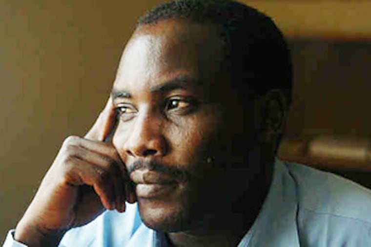 Adeeb Yousif, 34, says he was tortured and imprisoned in Sudan after he detailed atrocities that were being perpetrated against ethnic blacks in western Darfur. (SARAH J. GLOVER / Staff photographer)