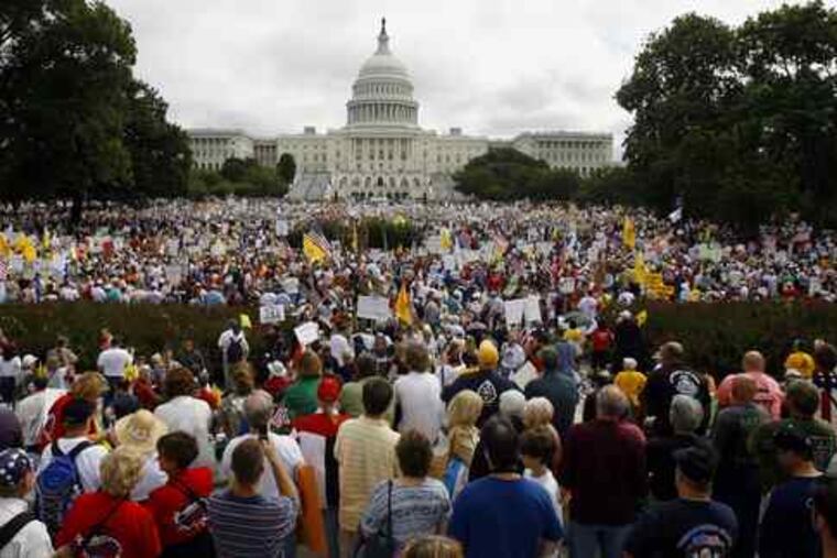 Protesters gather on Capitol Hill for the rally. "This is a crucial battle for the heart and soul of America," Sen. Jim DeMint said.