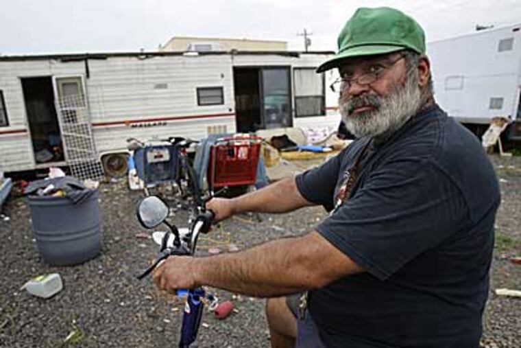 Brian "Caveman" Cummings outside the Cottman Avenue exit of I-95 in the Northeast.