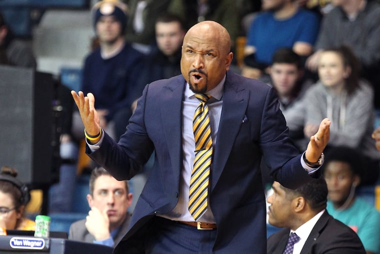 Coach Ashley Howard of La Salle urges one of his players to pass after driving the lane against UMass in the 2nd half on Jan. 30, 2019.