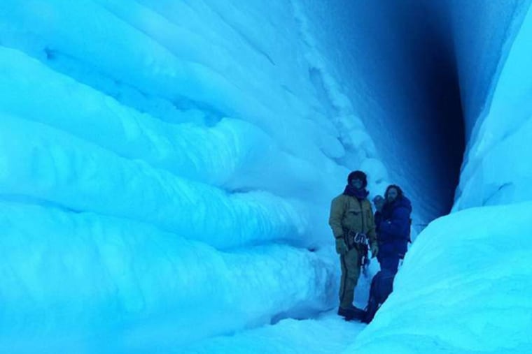 A snow day every day: The documentary features McMurdo Station research workers in a crevasse.