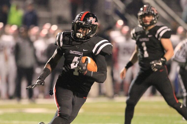 Coatesville running back Aaron Young (4) and quarterback Ricky Ortega (1) are Inquirer first-team all-Southeastern Pennsylvania selections.