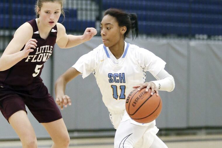 Springside Chestnut Hill Academy’s Mo’ne Davis drives the ball around Little Flower’s Natalie O’Neill on Thursday.