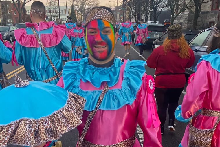 An emergency medicine resident at Einstein Medical Center has gone viral after he rushed to perform CPR on a man who collapsed during the Eagles game on New Year's Day — all while in his Mummer gear.