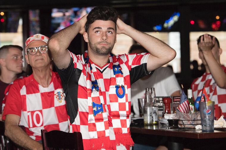 Croatian American, Even Kacic, shows some dejection during the last minutes of the televised World Cup game against France at Chickie's and Pete's in South Philadelphia.