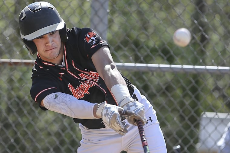 Marple Newtown Kevin Merrone smacks and RB single against Central League rival Garnet Valley.