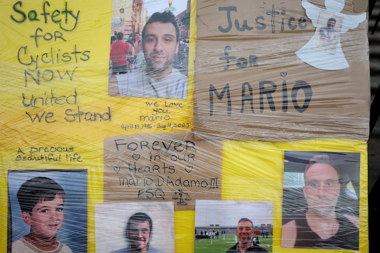 A collage of photos was on display during an event to honor the memory of Mario D'Adamo III in Philadelphia, on Aug. 4, 2024. D'Adamo was struck and killed while riding his bike in an unprotected bike lane in FDR Park in August 2023.