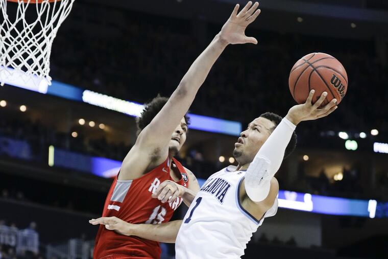 Villanova guard Jalen Brunson gets fouled driving to the basket against Radford forward Devonnte Holland during the first-half in the first round of the NCAA Men's Basketball Tournament on Thursday, March 15, 2018 at PPG Paints Arena in Pittsburgh.