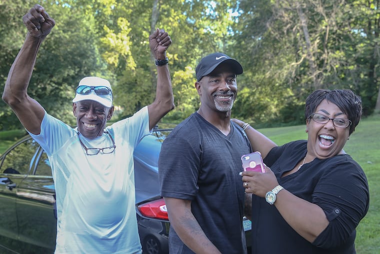 Chester Hollman III was ordered released from prison after serving 28 years of a life sentence for a murder for which he was innocent. Hollman celebrates with his father Chester Hollman, Jr., left and his sister Deanna as he takes his first steps of freedom from the State Correctional Institution at Retreat in Hunlock Creek, PA . The Commonwealth is expected to formally drop all charges against him later this month. Monday, July 15, 2019