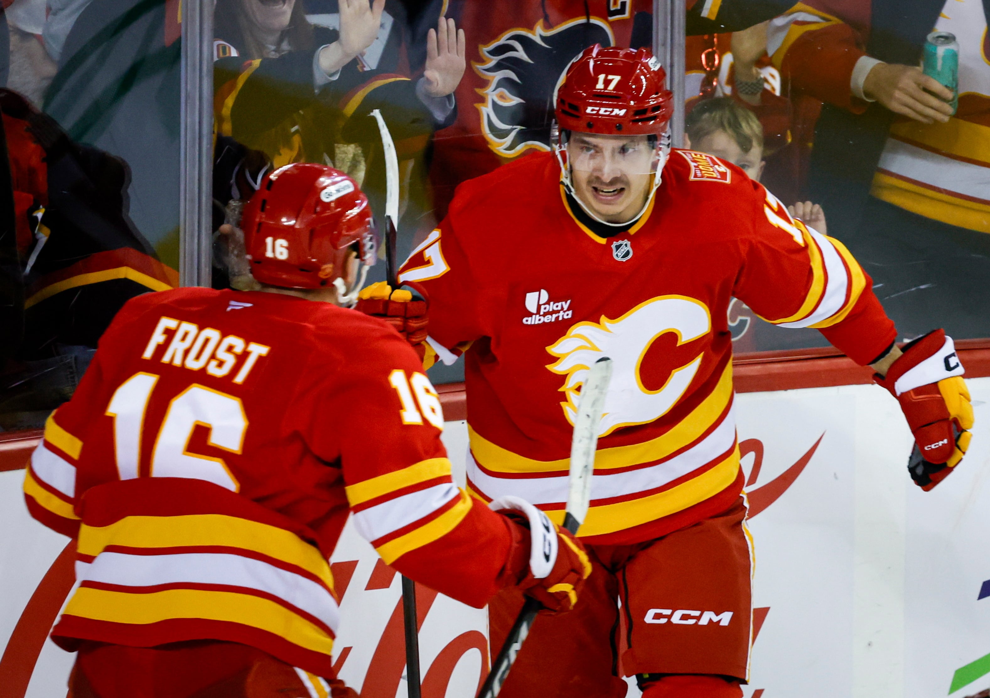Sharangovich breaks late tie as the Flames end the Hurricanes' 7-game winning streak