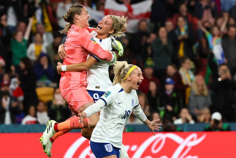 England's Chloe Kelly (18) celebrates after scoring the last goal during a penalty shootout IN the Women's World Cup round of 16 soccer match against Nigeria.