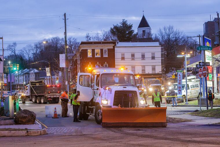 Philadelphia Streets Department employees on Kelly Drive near Midvale Avenue in Philadelphia.