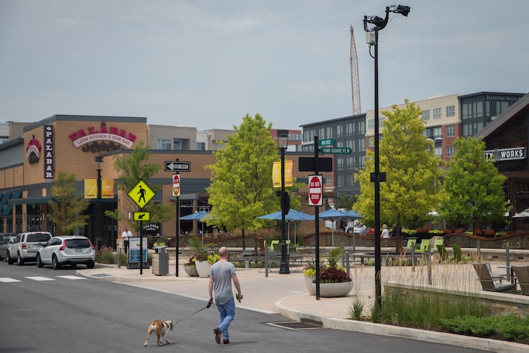 King of Prussia Town Center, situated near I-76 and King of Prussia Mall, July 13th, 2017. The developer-driven town comes complete with an Astroturf town green, parallel parking spaces, and streets named "Village Drive" and "Main Street."