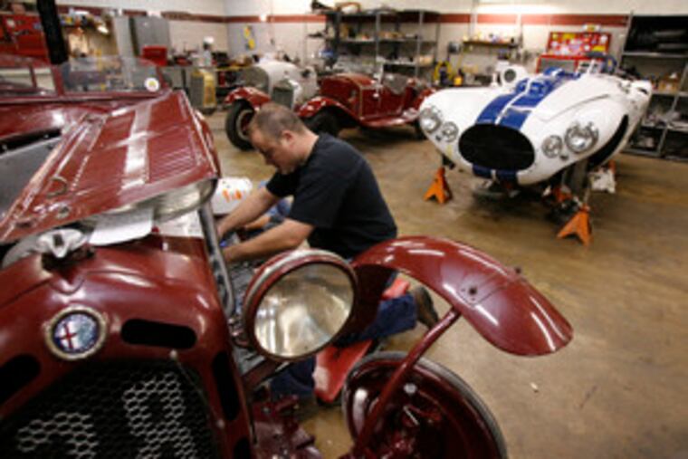 Josh Baldwin of David George's shop prepares a 1934 Alfa Romeo Monza for delivery. It's "the best Alfa in the world," says George. "This car is nothing but engine." Prewar Alfa Romeos are George's specialty.