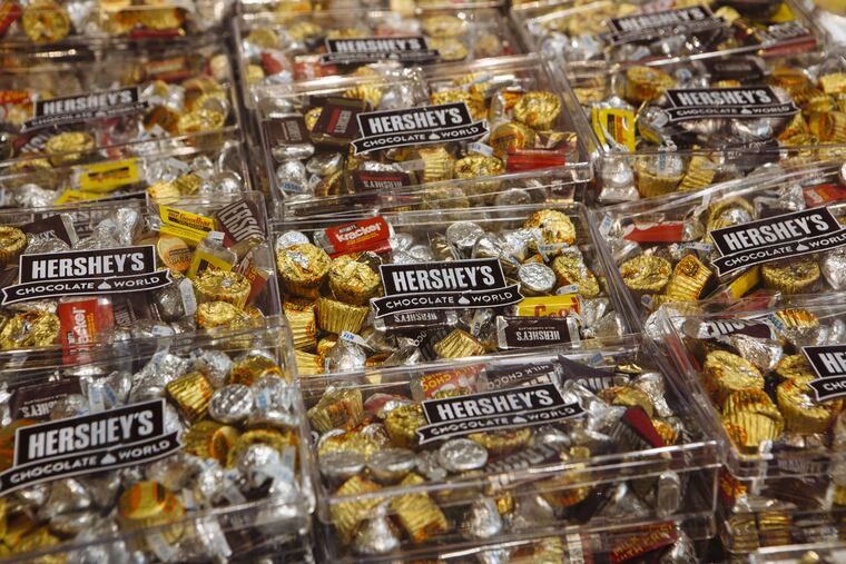 Boxes of assorted chocolates sit on display for sale at the Hershey Co. Chocolate World store in Hershey, Pa., on July 13, 2018.