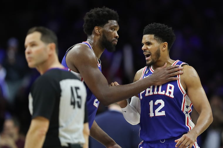 Sixers forward Tobias Harris celebrates after making a fourth quarter three-point basket with teammate center Joel Embiid against the Memphis Grizzlies on Thursday, February 23, 2023 in Philadelphia.