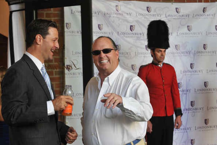 J. Brian O'Neill (center) with State Rep. Mike Gerber (D., Montgomery) at the opening of a Conshohocken development.