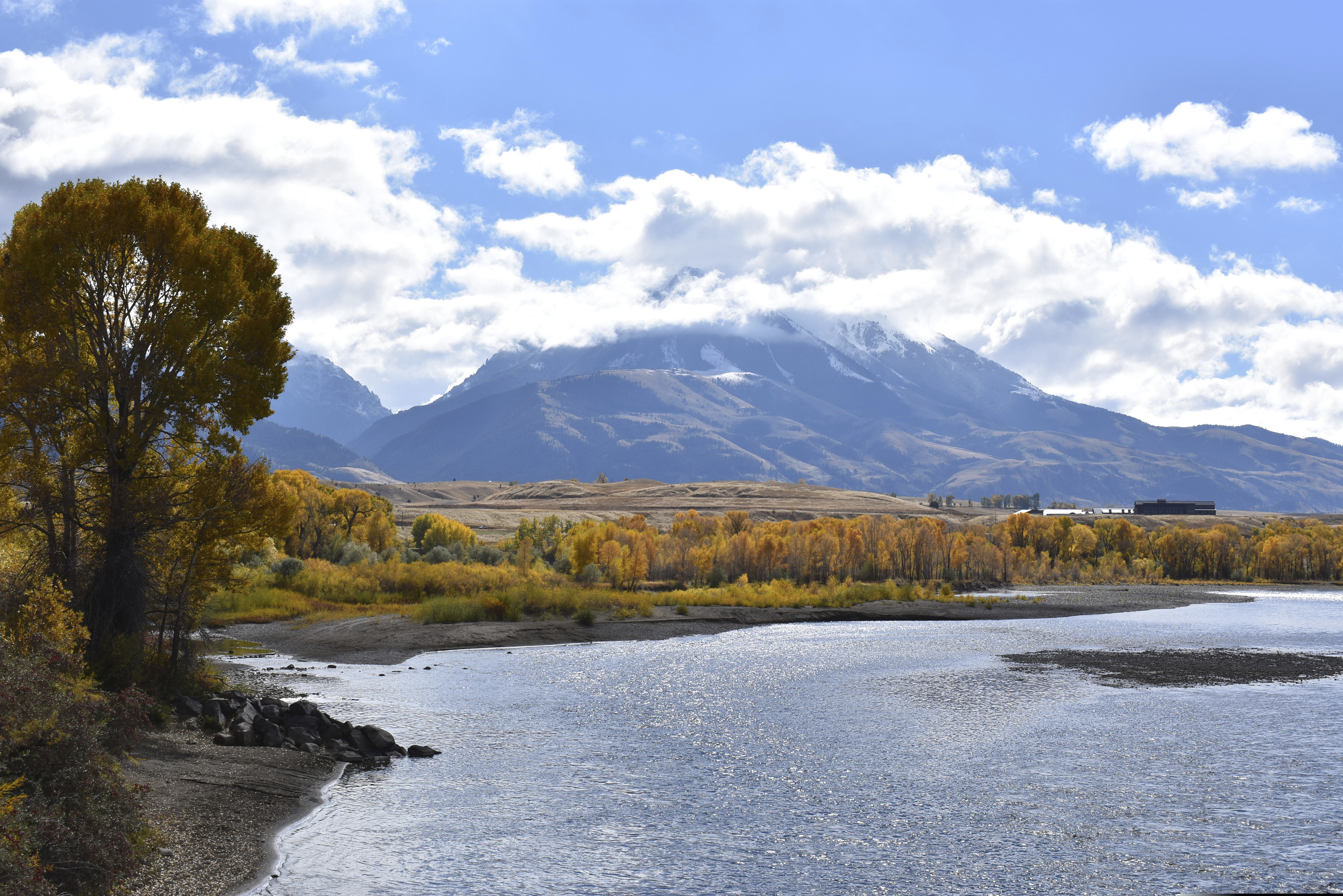 In this Oct. 8, 2018 photo, emigrant Peak is seen rising above the Paradise Valley and the Yellowstone River near Emigrant, Mont.