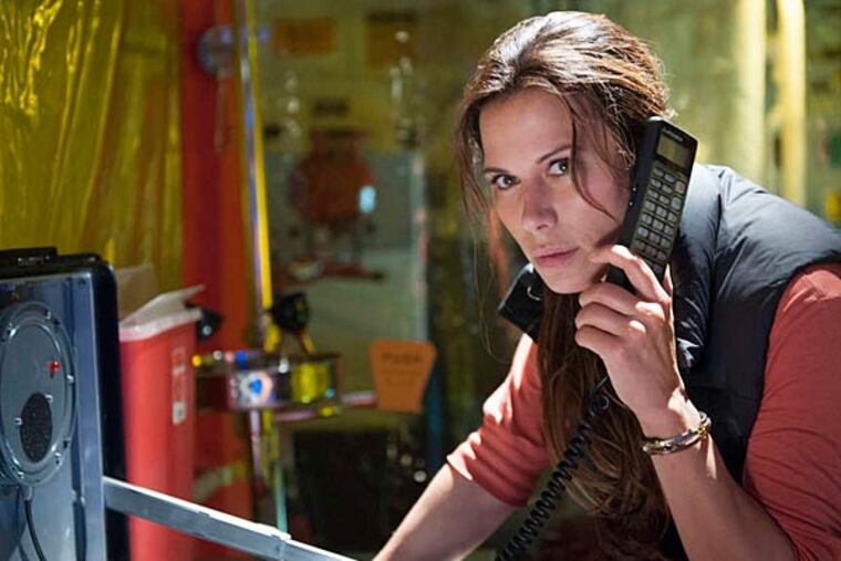 Rhona Mitra is paleomicrobiologist Rachel Scott searching for the cure to a deadly global virus in "The Last Ship" a 10-part mini-series that begins Sunday on TNT.