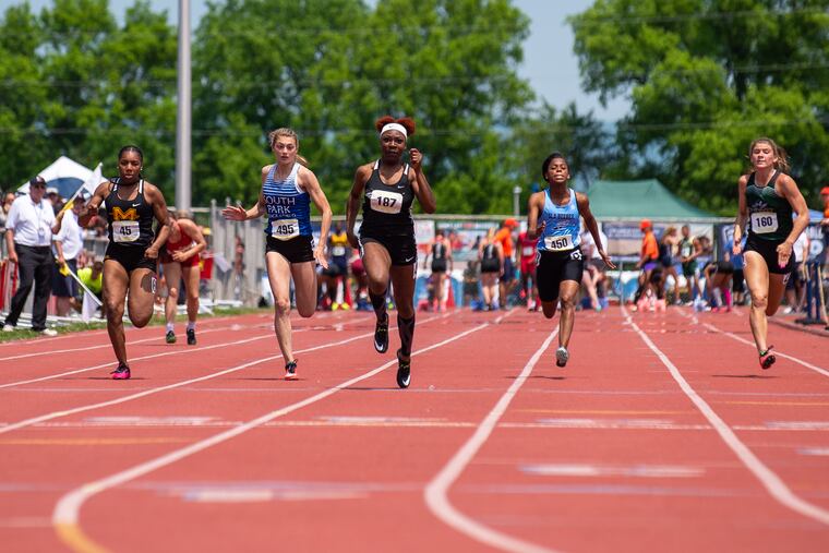 Thelma Davies from Girard College drives to the finish line to finish first in the girls Class 3A 100m dash finals at the PIAA State Track and Field Championships at Shippensburg University on Saturday, May 25, 2019. KRISTON JAE BETHEL / For The Inquirer