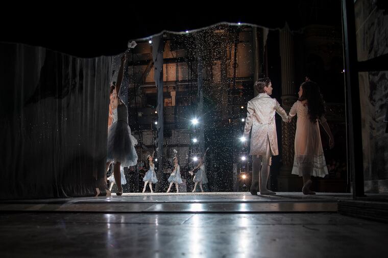Pennsylvania Ballet students enter the stage at the end of the Snowflake dance in The Nutcracker at the Academy of Music last year. Owing to COVID-19 shutdowns, an archived recording of the holiday tradition will be streamed this year, in lieu of the staged peformance.