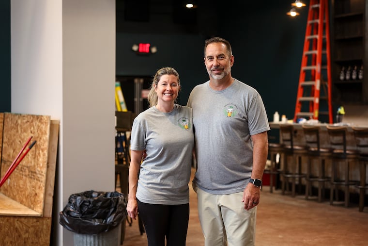 Co-owners Colleen Gibson and John Wagner posed for a portrait at Freckled Jawn Brewing on Thursday, Aug. 27, 2026 in Woodbury, N.J.