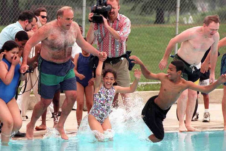 During his tenure as mayor, Ed Rendell gathered a group of children together to inaugurate the reopening of a swimming pool in Hunting Park. Also on hand was the city's police commissioner, John Timoney (right).
