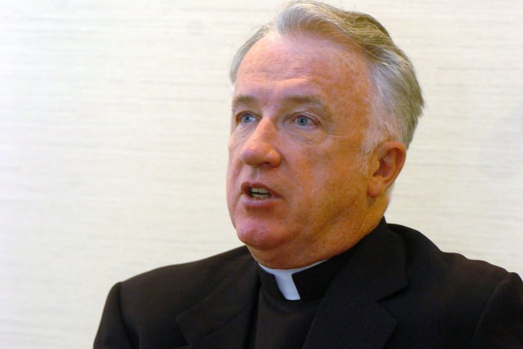 FILE – This Feb. 21, 2005, file photo, shows incoming bishop of the Wheeling-Charleston diocese, W.Va, Michael Bransfield in his new office, in Wheeling, W.Va.