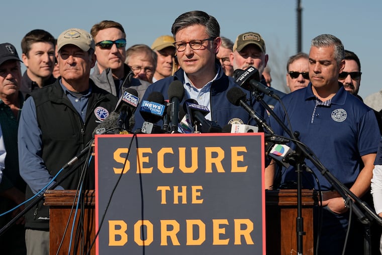 U.S. House Speaker Mike Johnson speaks while standing with Republican members of Congress on Jan. 3 in Eagle Pass, Texas. The House GOP has proposed anti-immigrant measures that undercut America’s standing as a welcoming nation, writes the Editorial Board.