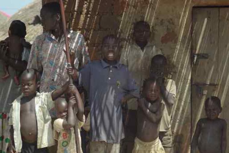 Children at a camp in northern Uganda for those displaced by armed conflict. Abitimo Rebecca Odongkara's school is aimed at educating and giving hope to such young people.