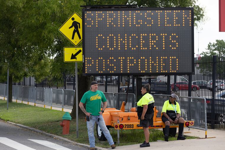Bruce Springsteen postponed his two Philadelphia shows at Citizens Bank Park due to illness, as a sign indicated on Aug. 16.