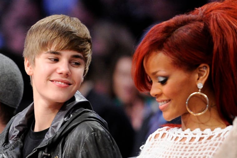 An anonymous source close to Justin Bieber and Rihanna said the pop stars performed an impromptu "duet" at a hotel in New York during the taping of the Victoria's Secret Fashion Show. (AP Photo)