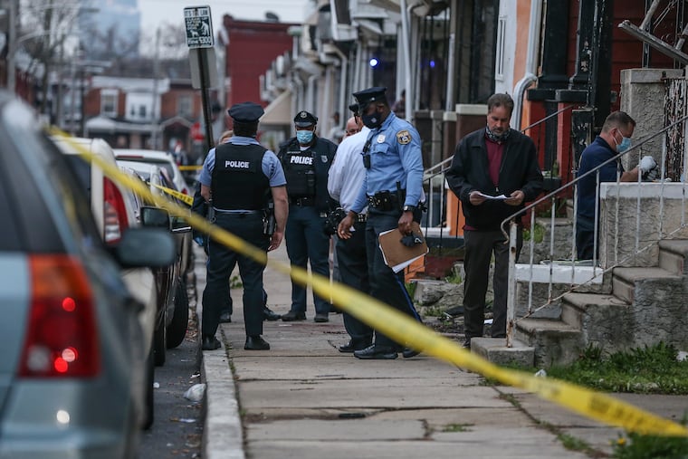 Police on the scene in the 2900 block of N. Taney street where a man was fatally shot about 5:30, Wednesday, April 14, 2021.