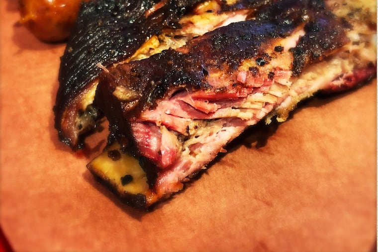 A pink halo in the meat is a tell tale sign of the deep smoke on the spare ribs at Mike's BBQ.