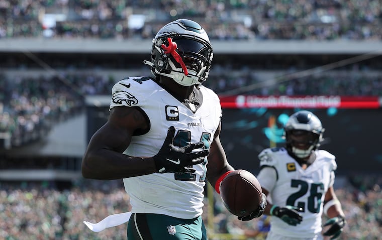 Eagles wide receiver A.J. Brown celebrates a third-quarter touchdown against the Los Angeles Rams, his first of the season.