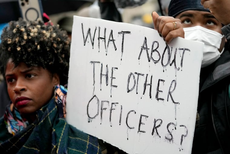 Protesters march Saturday in Memphis, Tenn., over the death of Tyre Nichols, who was beaten by Memphis police during a traffic stop.