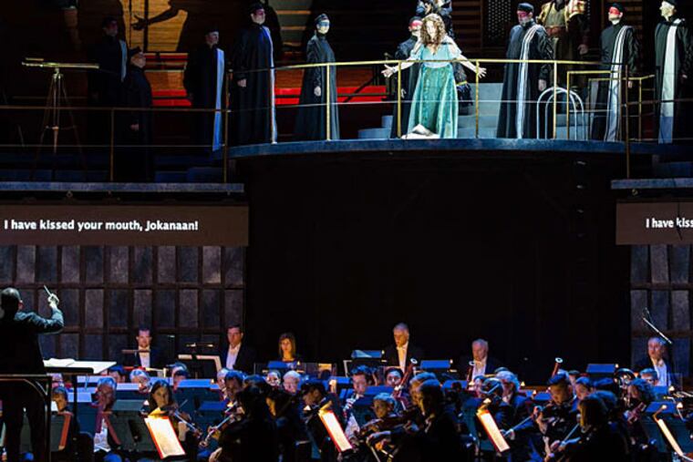 Yannick Nézet-Séguin conducts "Salome" at Verizon Hall, with the singers above and behind the Philadelphia Orchestra. The unusual staging and Richard Strauss' ever-combusting score created acoustical disadvantages. (Dominic Mercier)