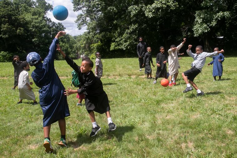 Boys at Germantown Masjid play various sports in the park down the street from the mosque in Philadelphia in July.