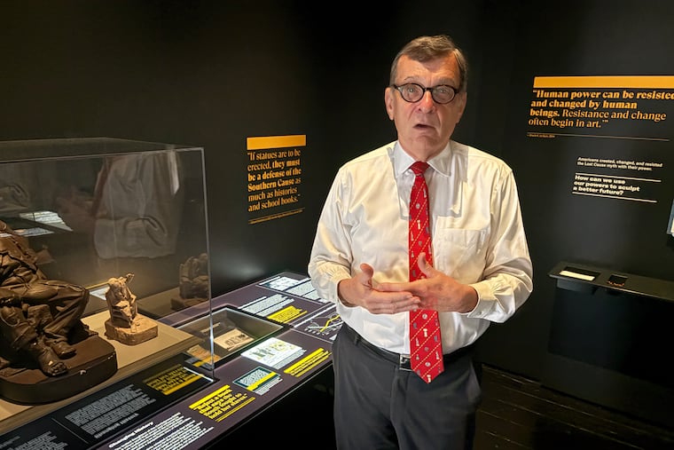 William J. Martin, director of The Valentine museum in Richmond, stands on Aug. 19, 2025, in an exhibit explaining how the museum's namesake — Civil War-era sculptor Edward Valentine — created images that gave life to the myth of the Lost Cause, which held that Black people were happy to be enslaved and the Civil War was a noble cause. Martin died last weekend after a traffic accident near the museum.
