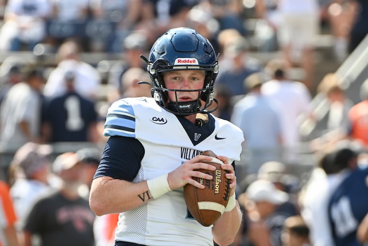 Villanova quarterback Pat McQuaide warms up before for a matchup with Penn State on Sept. 13.