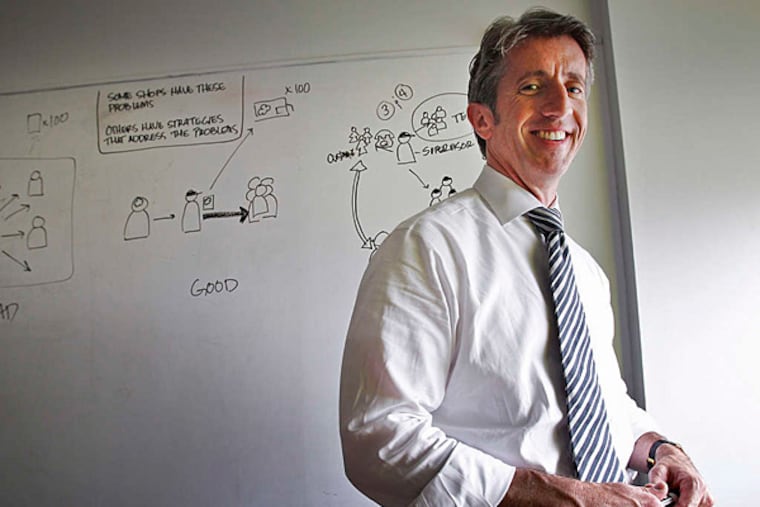 Harold Hambrose , founder and chief executive of Electronic Ink, works to help companies streamline their productivity. (Alejandro A. Alvarez/Staff)