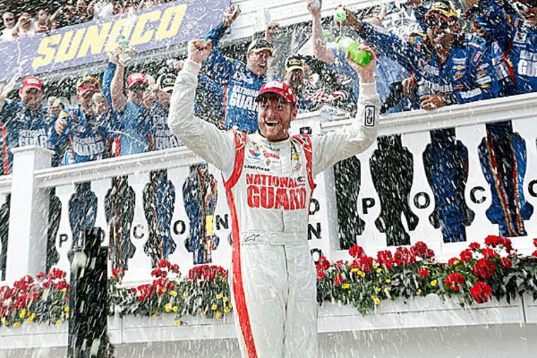Dale Earnhardt Jr. celebrates victory at Pocono. (Associated Press).