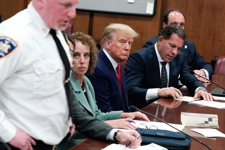 Former U.S. president Donald Trump appears in court at the Manhattan Criminal Court in New York on Tuesday, April 4, 2023.