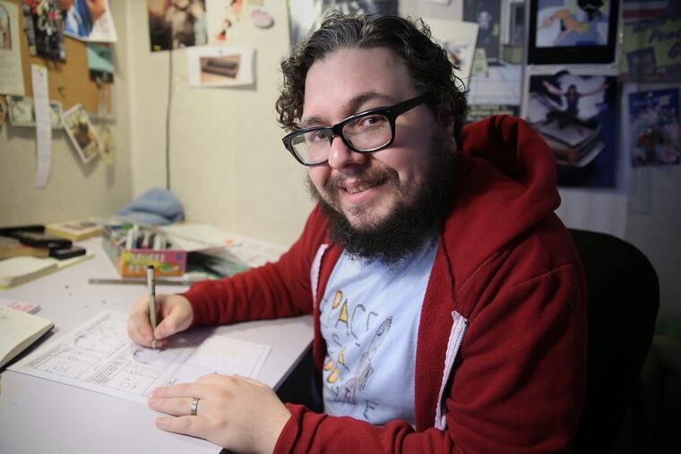 Illustrator Box Brown sits for a portrait at his studio in his Kensington home. Brown's new graphic novel about entertainer Andy Kaufman, "Is This Guy For Real?," comes out in February.