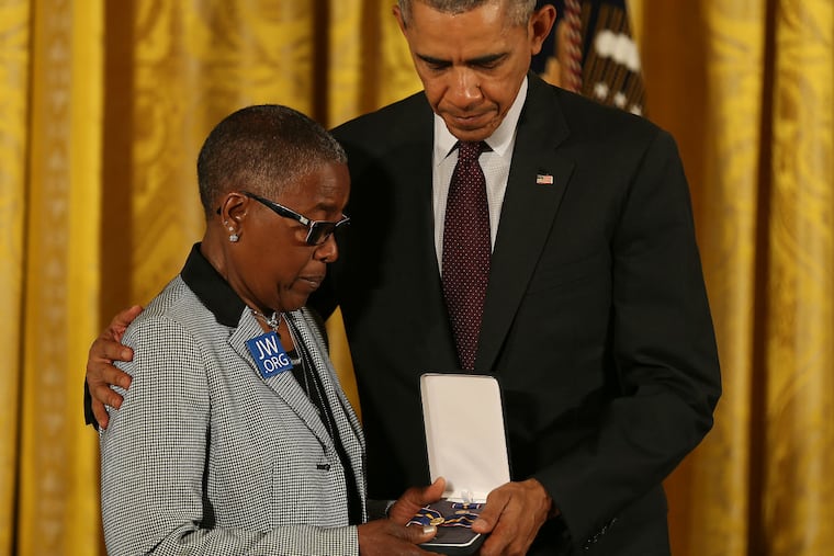 President Barack Obama posthumously awards the Public Safety Officer Medal of Valor to fallen Philadelphia Police Sgt. Robert Wilson III to his grandmother Constance Wilson on May 16, 2016 at the White House in Washington, DC.