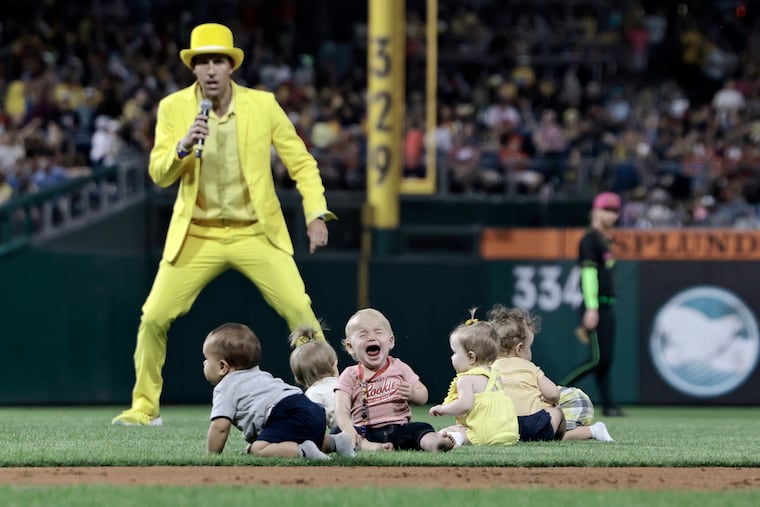 Savannah Bananas owner Jesse Cole watches over the crawling baby race during the 2024 Banana Ball World Tour, featuring the Savannah Bananas vs. the Party Animals at Citizens Bank Park in Philadelphia on Saturday.