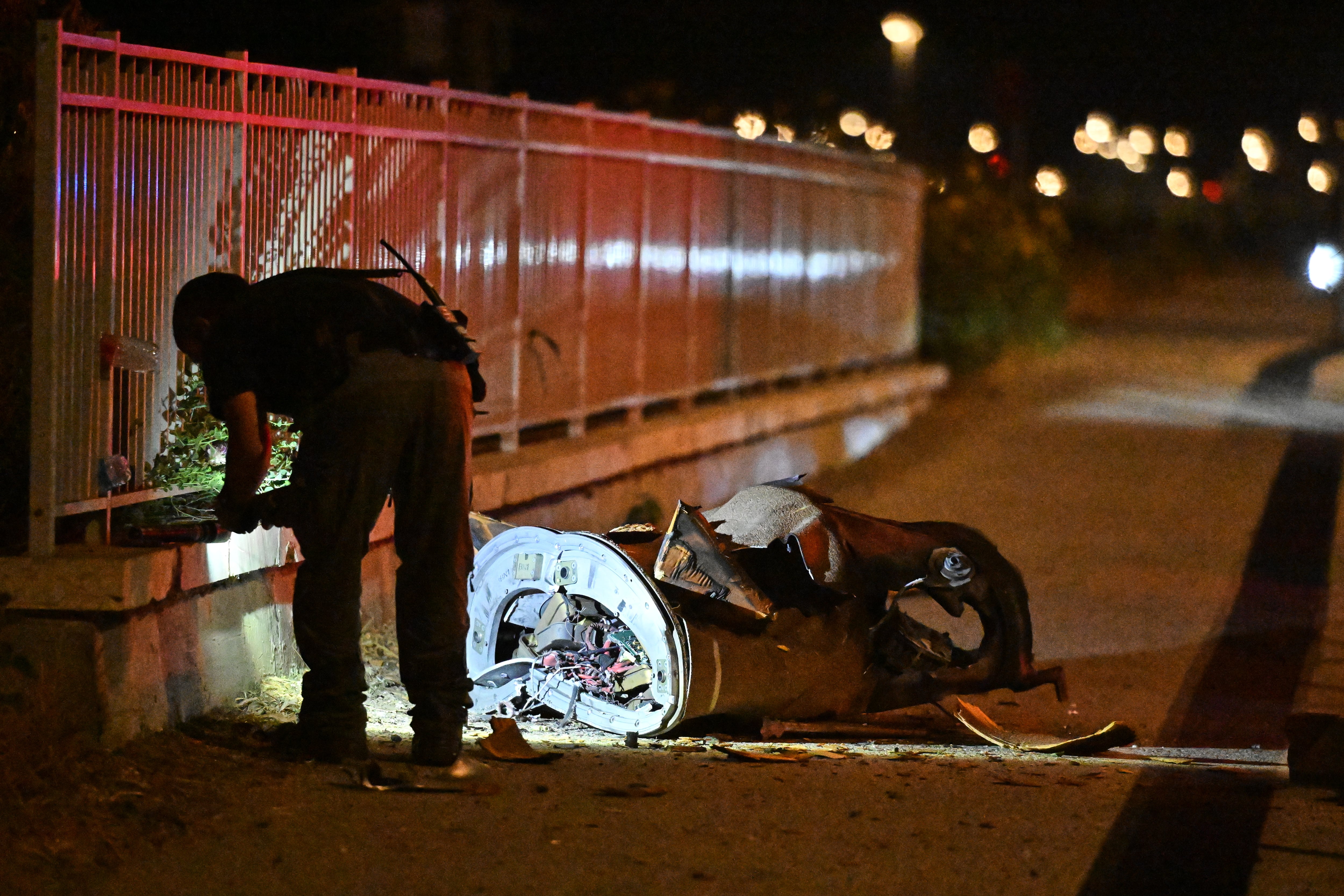 The Latest: Israel and Iran exchange fire as hostilities escalate