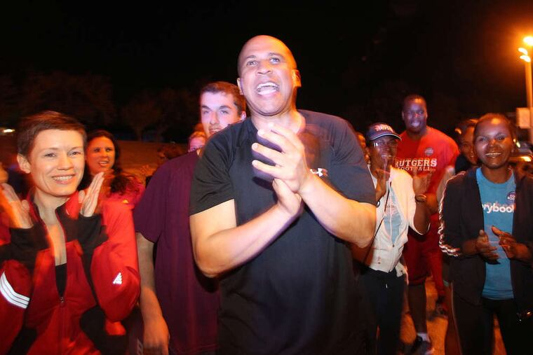 Cory Booker, mayor of Newark, N.J., and the Democratic candidate for U.S. Senate, joins supporters in Cherry Hill before going on a run with township Mayor Chuck Cahn.