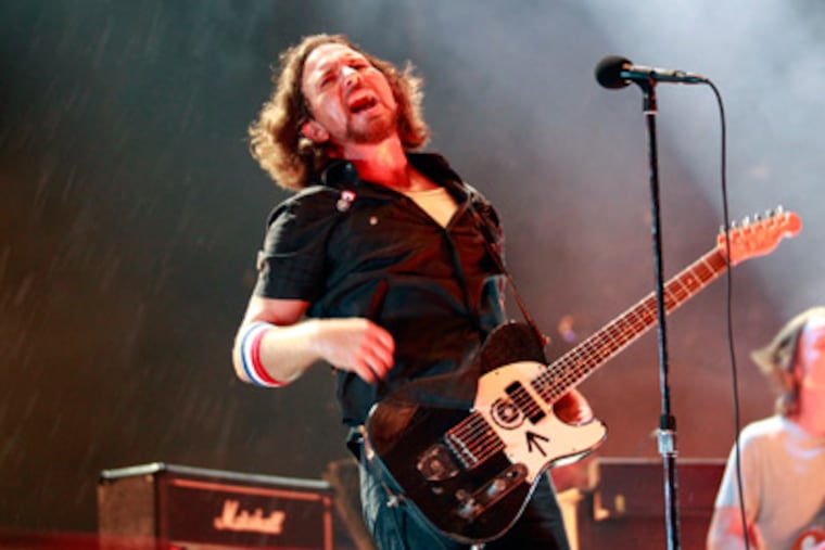 Pearl Jams performs on the Liberty Stage during the Made In America Music Festival along the Benjamin Franklin Parkway on Sunday, September 2, 2012. ( Yong Kim / Staff Photographer )